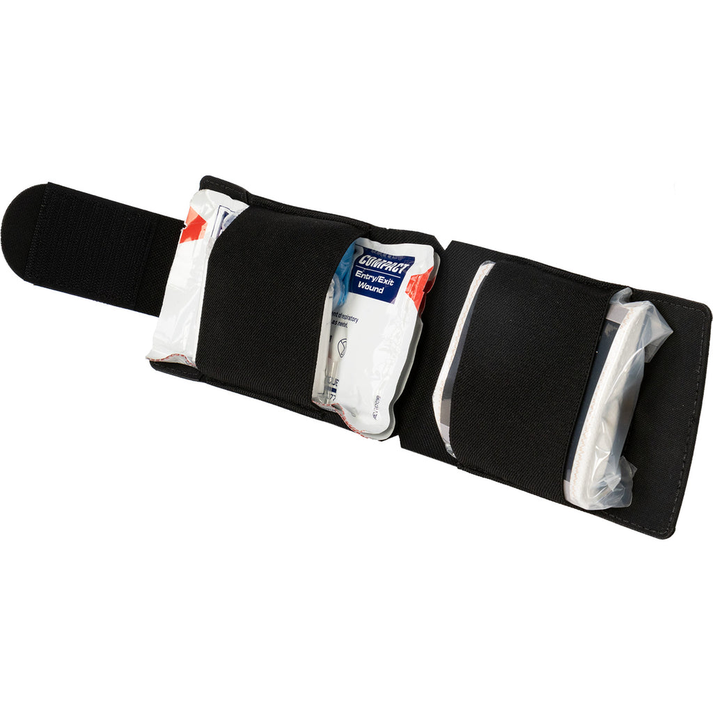 Open North American Rescue EDC wallet kit showing concealed trauma medical wallet with chest seal and wound packing gauze in internal pockets