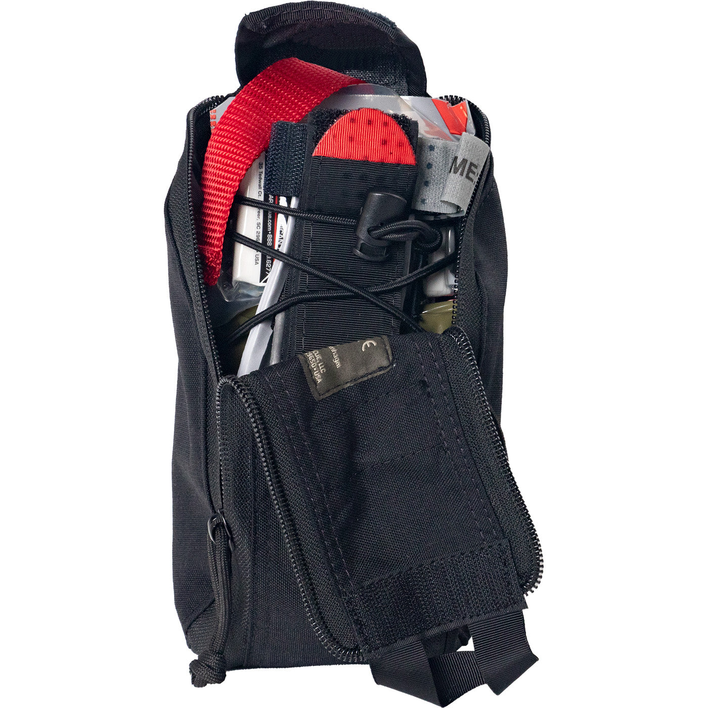 Front view of Eagle IFAK pouch partially opened showing tactical trauma kit with tourniquet secured inside, quick pull tab access, and emergency medical supplies