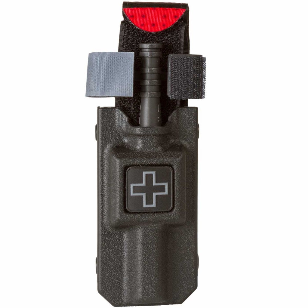 Gen 7 C-A-T Combat Application Tourniquet stored in a rigid belt-mounted case with medical cross identifier patch on front